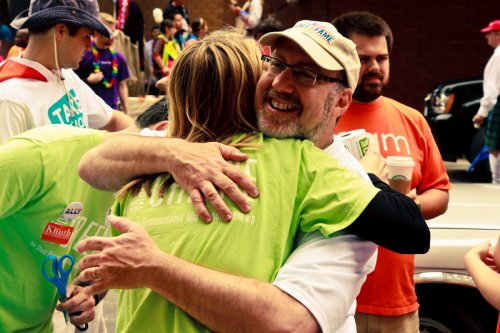 Rep. Frank Hornstein hugs Rep. Marion Greene at Twin Cities Pride.
